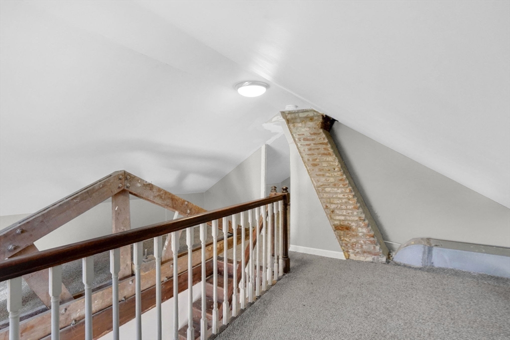 41 Florida Street Springfield, MA 01109 - Photo 29 of 41 a view of staircase with railing and white walls