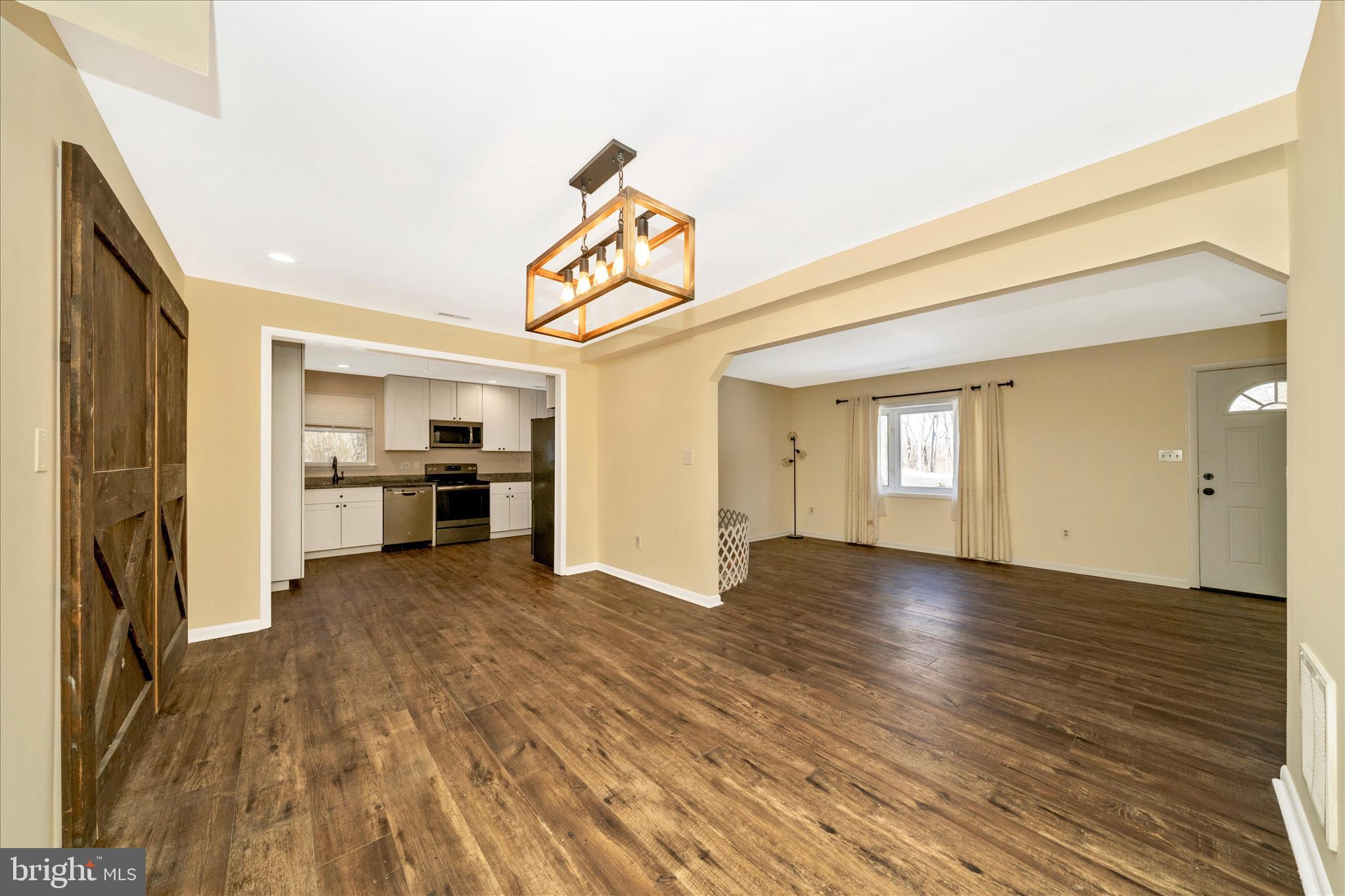 923 Klees Mill Road Westminster, MD 21157 - Photo 11 of 52 a view of a kitchen with a sink and a refrigerator
