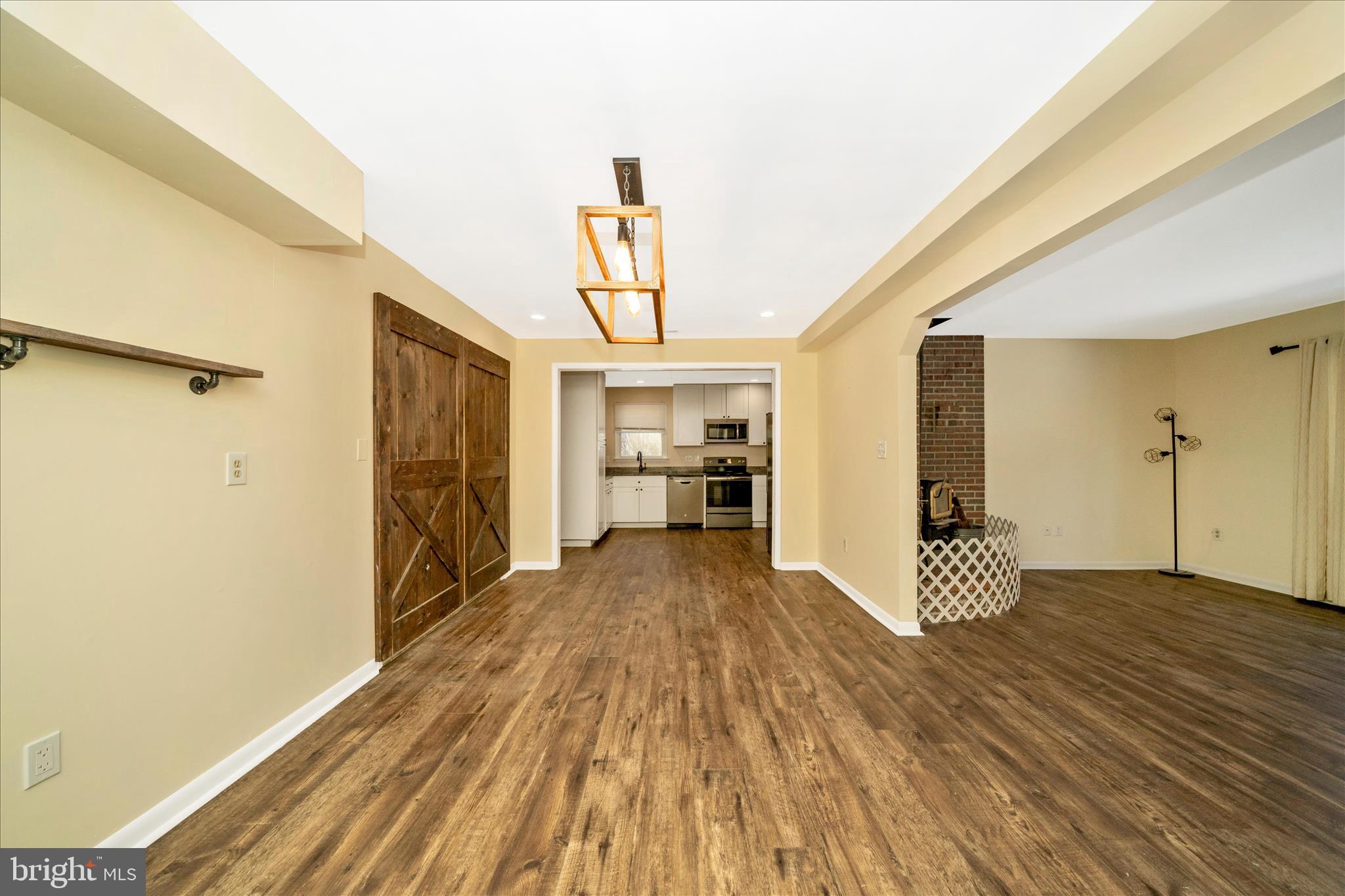 923 Klees Mill Road Westminster, MD 21157 - Photo 13 of 52 a view of empty room with wooden floor