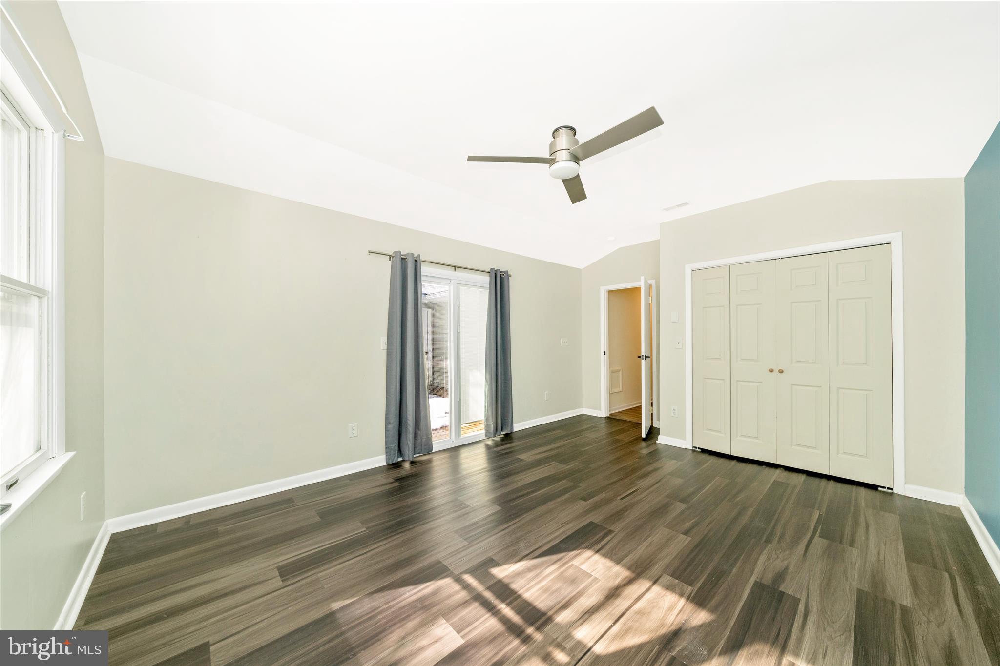 923 Klees Mill Road Westminster, MD 21157 - Photo 24 of 52 a view of empty room with wooden floor and fan