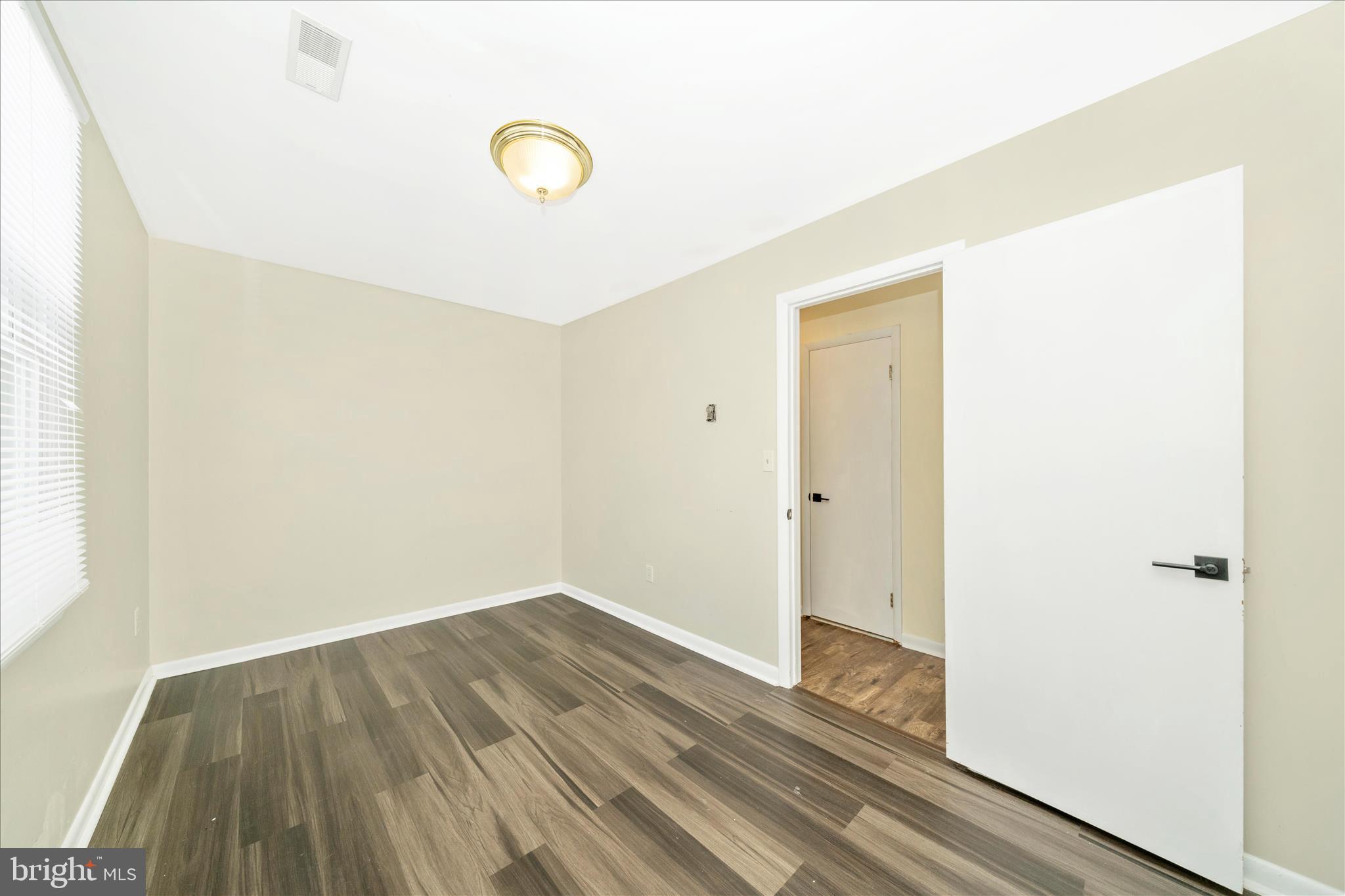 923 Klees Mill Road Westminster, MD 21157 - Photo 26 of 52 a view of a room with wooden floor