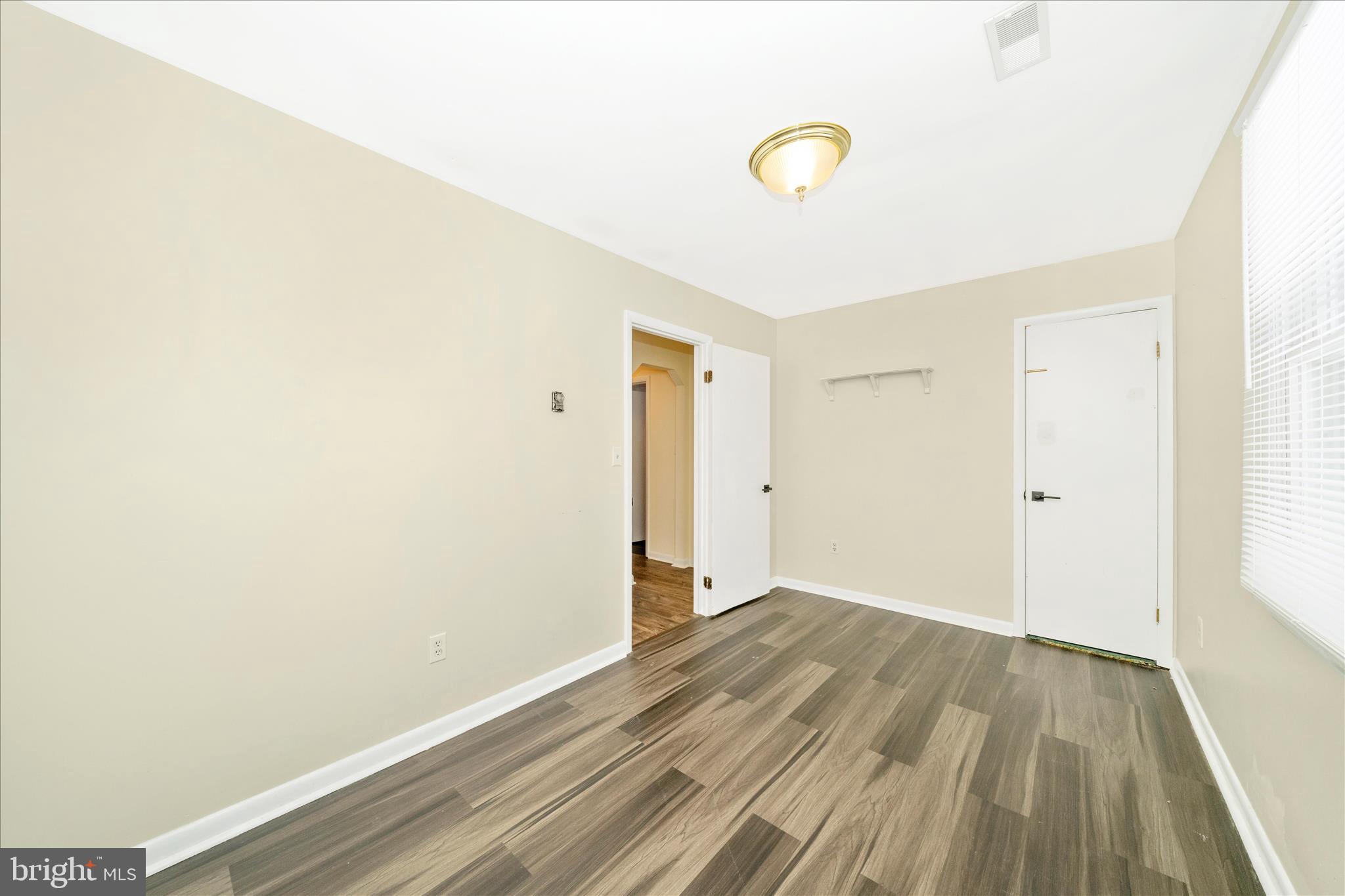 923 Klees Mill Road Westminster, MD 21157 - Photo 27 of 52 a view of a room with wooden floor