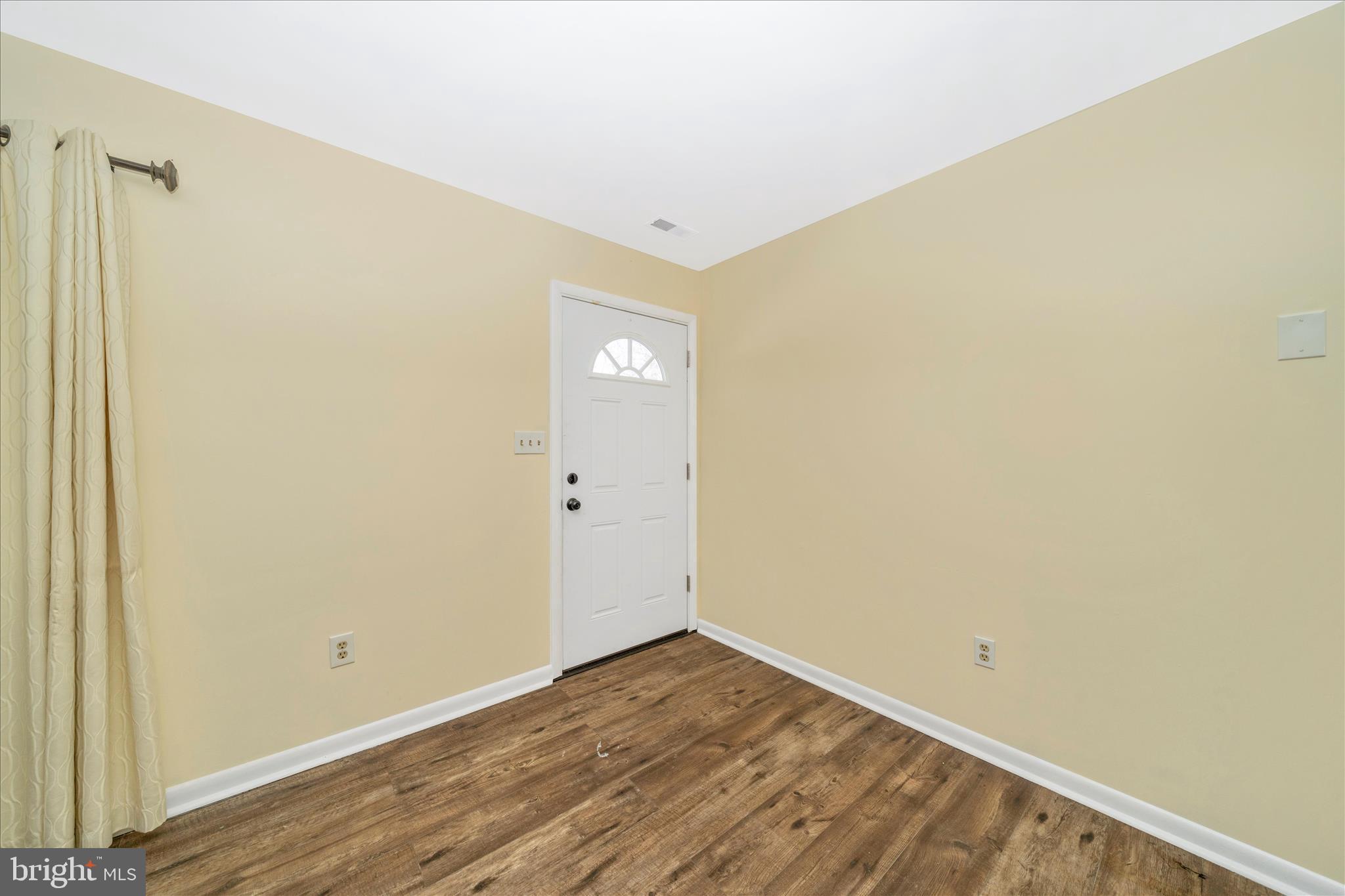 923 Klees Mill Road Westminster, MD 21157 - Photo 3 of 52 a view of a room with wooden floor
