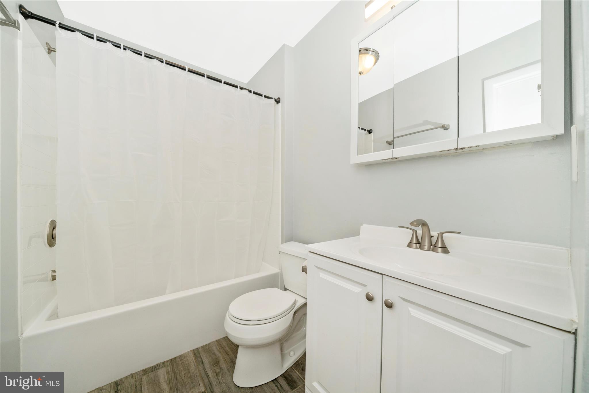 923 Klees Mill Road Westminster, MD 21157 - Photo 32 of 52 a bathroom with a sink toilet and shower