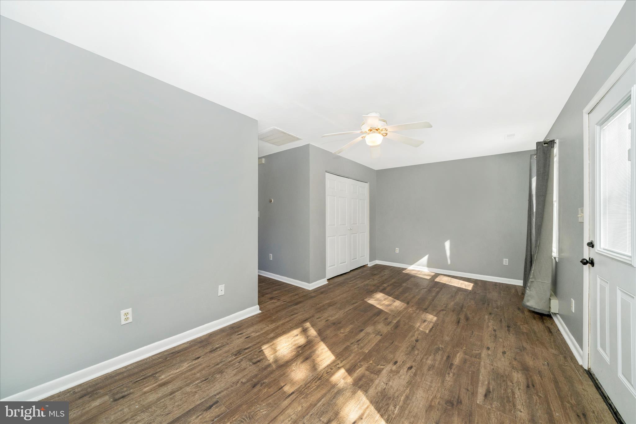 923 Klees Mill Road Westminster, MD 21157 - Photo 36 of 52 a view of an empty room with wooden floor