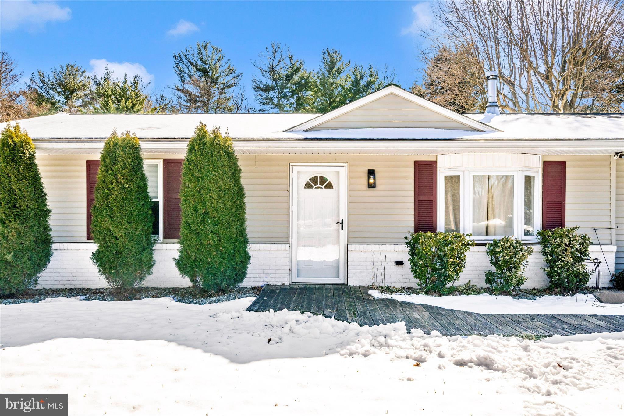 923 Klees Mill Road Westminster, MD 21157 - Photo 49 of 52 a front view of a house with garden