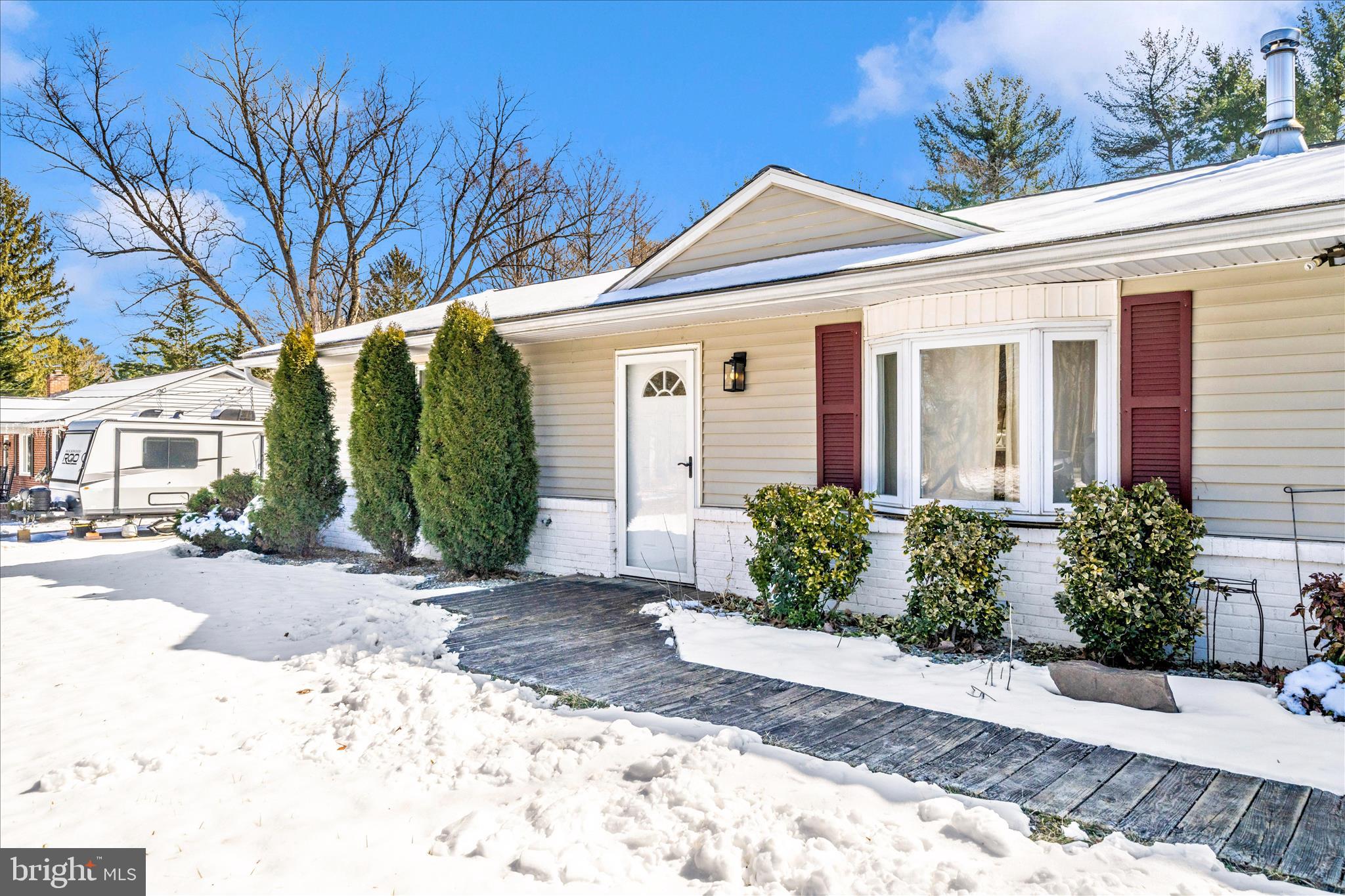 923 Klees Mill Road Westminster, MD 21157 - Photo 51 of 52 a front view of a house with garden