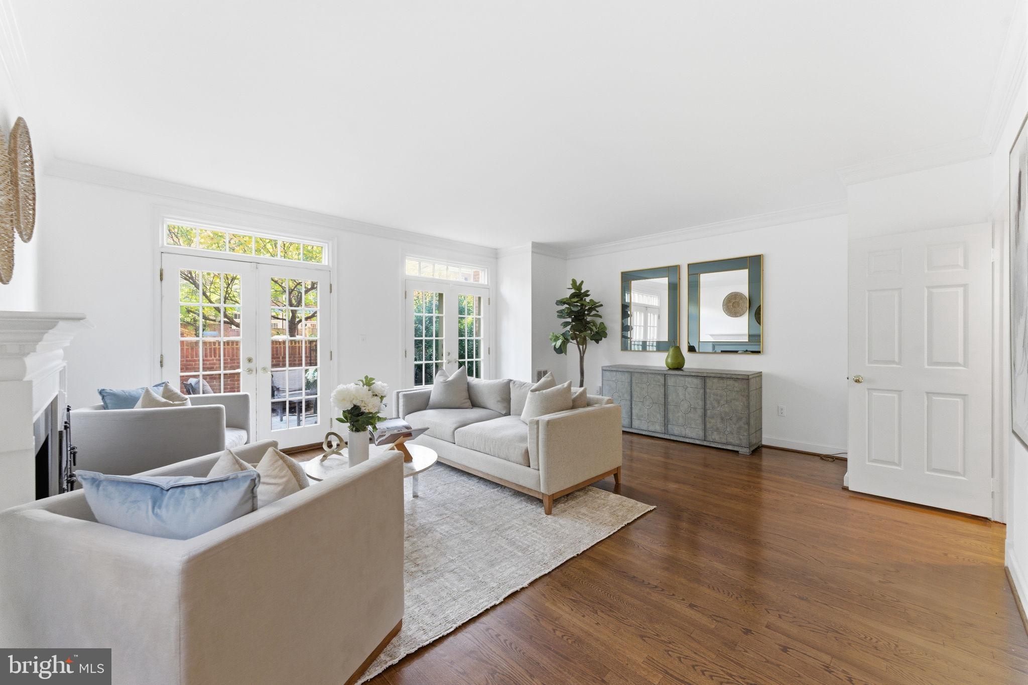4354 Westover Place Northwest Washington, DC 20016 - Photo 12 of 63 a living room with furniture and three large window