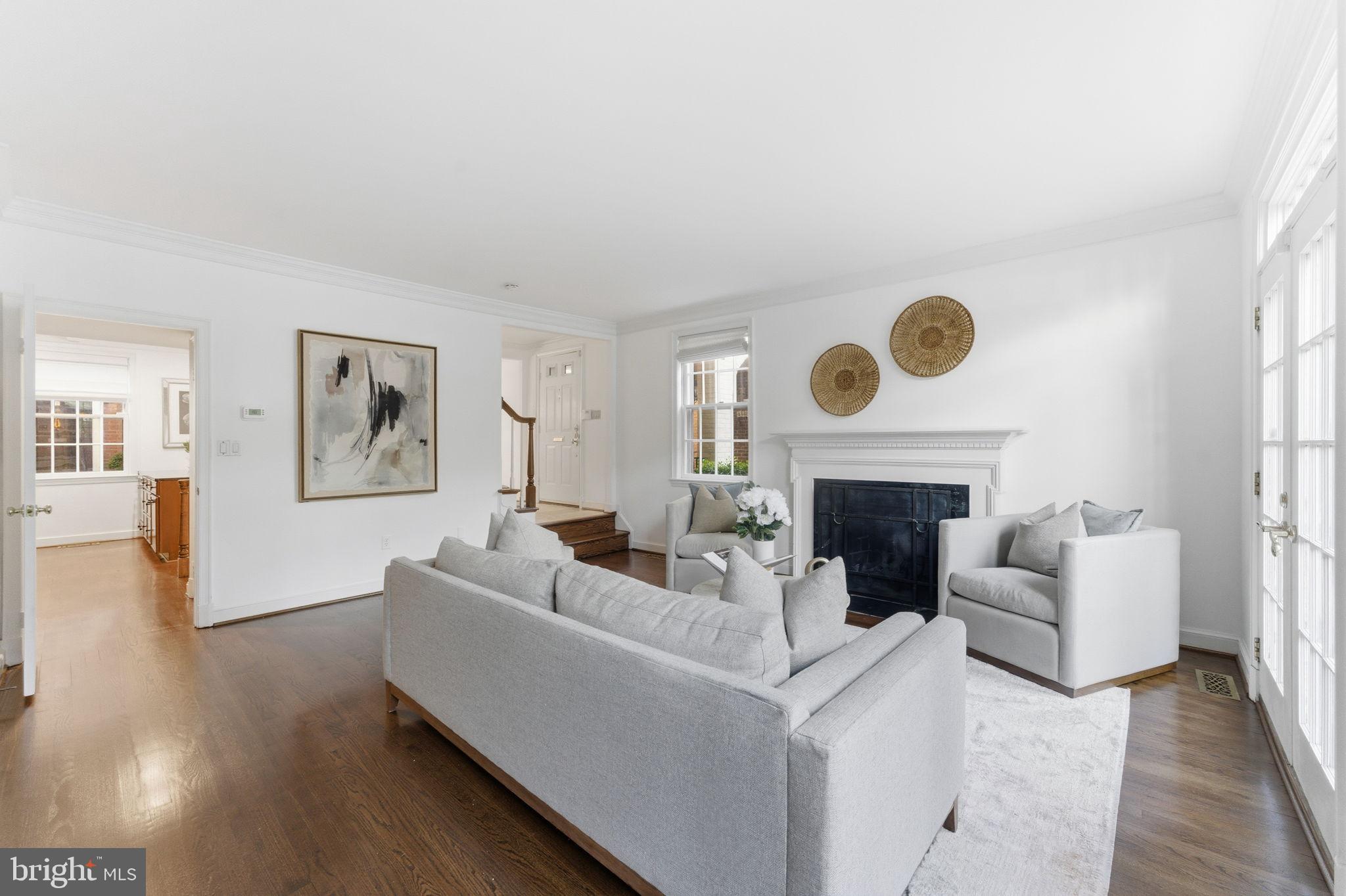 4354 Westover Place Northwest Washington, DC 20016 - Photo 13 of 63 a living room with furniture a fireplace and a large window