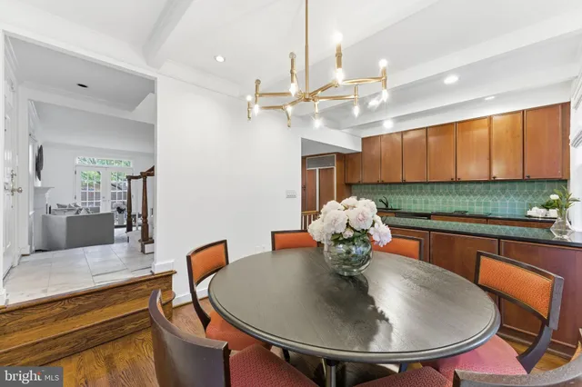 a kitchen with granite countertop a stove top oven and sink