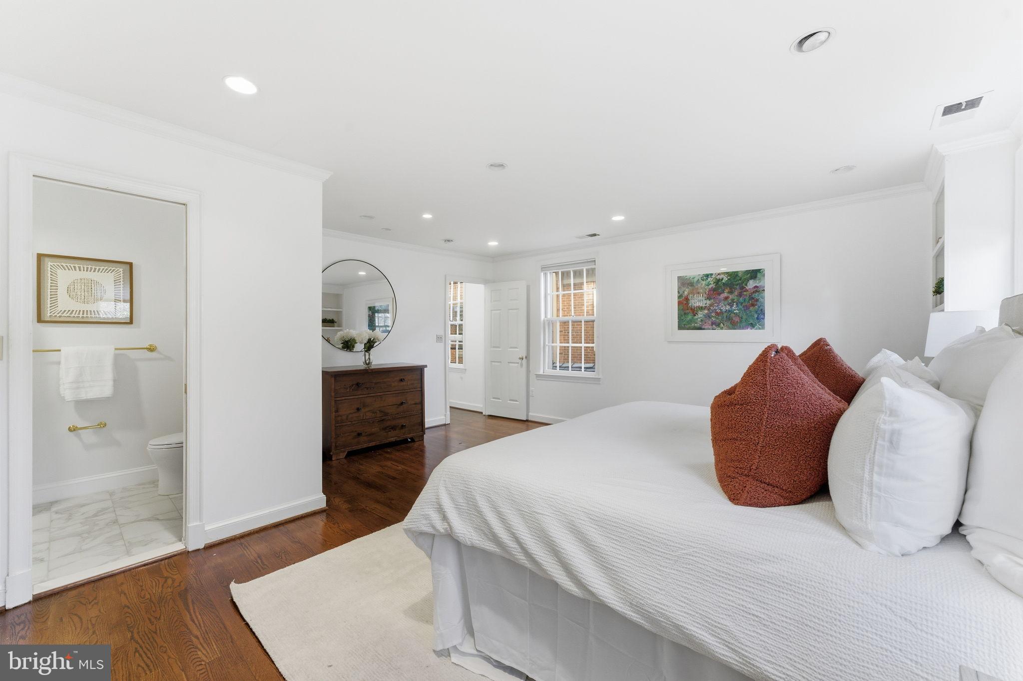 4354 Westover Place Northwest Washington, DC 20016 - Photo 29 of 63 a bedroom with a bed and wooden floor