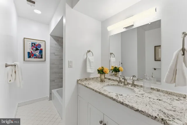 a view of balcony with furniture