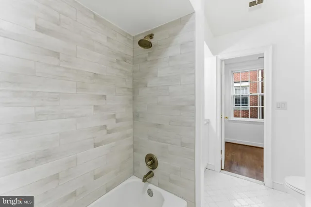 a view of a balcony with door