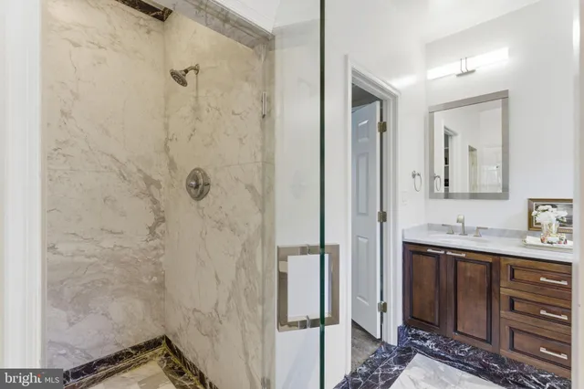 a view of entryway with wooden floor and stairs