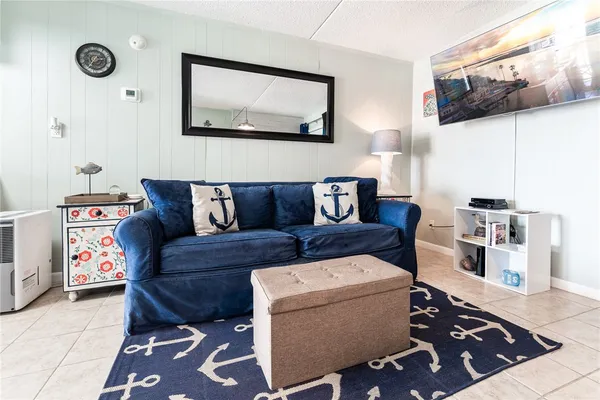 a living room with furniture and a couch