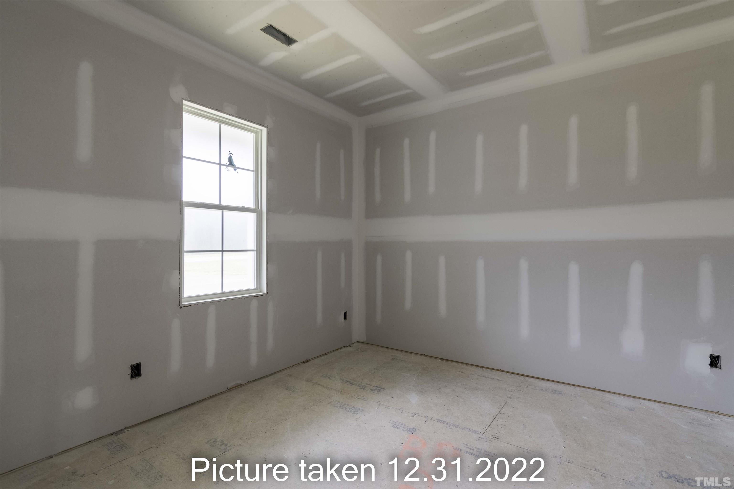 5140 Frazier Road Middlesex, NC 27557 - Photo 19 of 35 an empty room with windows