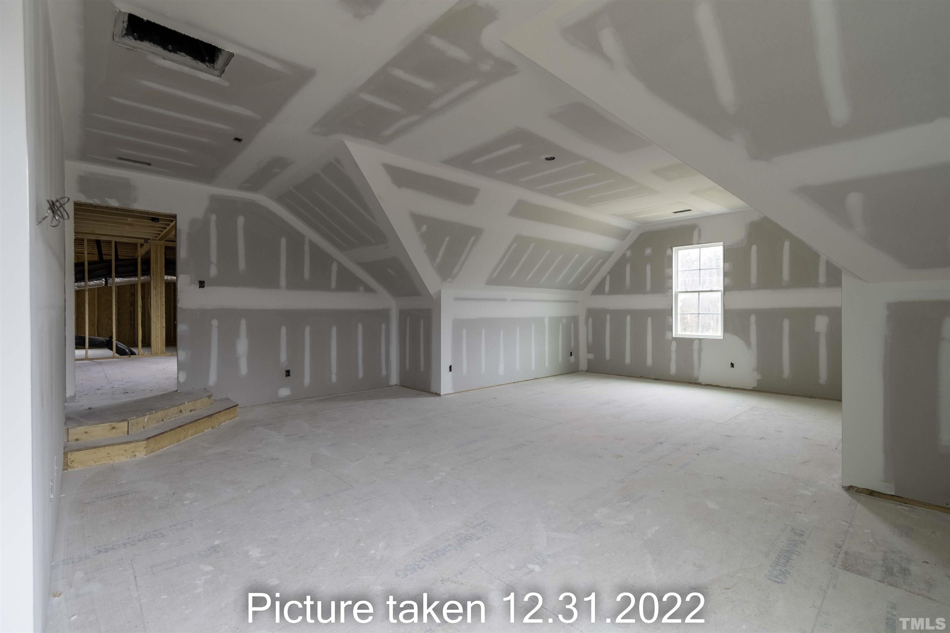 5140 Frazier Road Middlesex, NC 27557 - Photo 28 of 35 a view of an empty room with a window