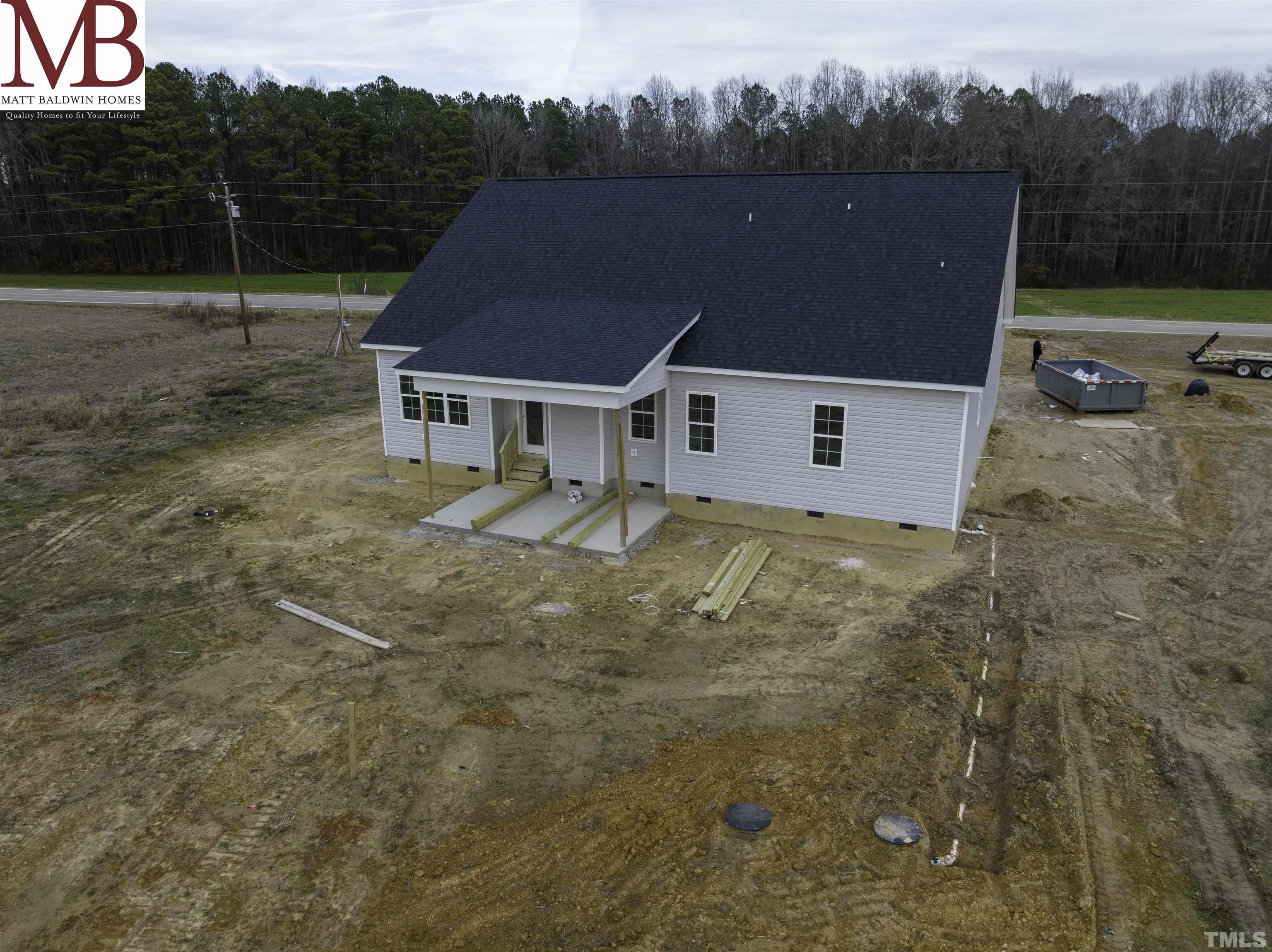 5140 Frazier Road Middlesex, NC 27557 - Photo 35 of 35 an aerial view of a house with a yard