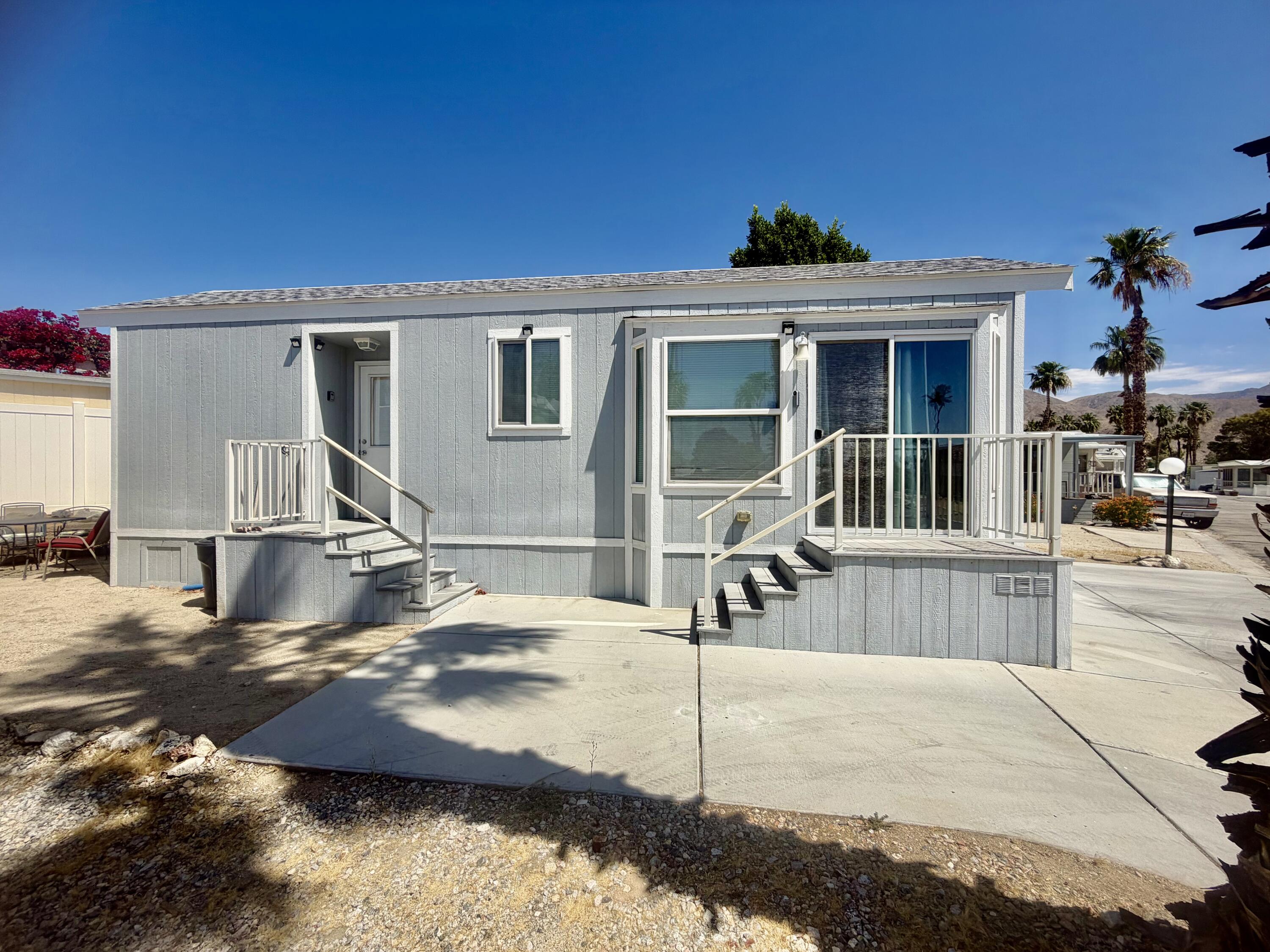 74711 Dillon Road, Unit 264 Desert Hot Springs, CA 92241 - Photo 4 of 21 a view of a house with wooden floor