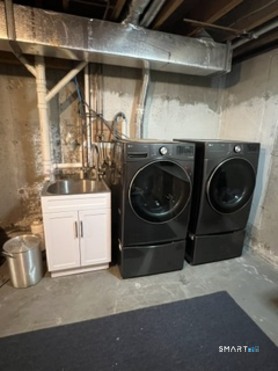 72 Pinnacle Road Ellington, CT 06029 - Photo 35 of 38 a utility room with dryer and washer