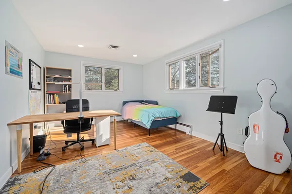 a workspace with furniture and window
