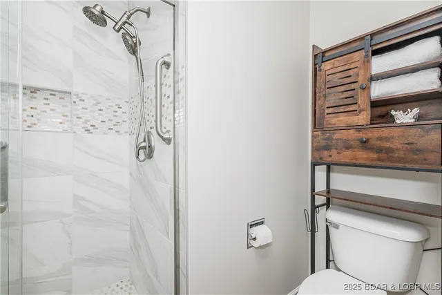 $400,000 | 64 Port Royale Drive, Unit 1B, Sunrise Beach, MO 65079