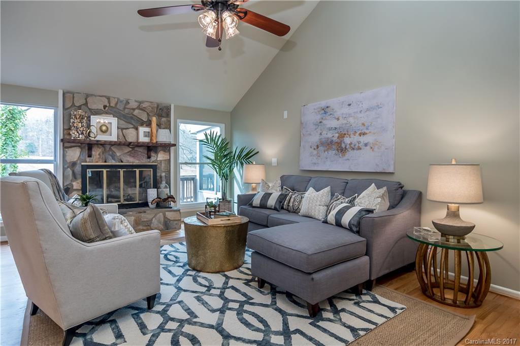 9300 Fairway Ridge Road Charlotte, NC 28277 - Photo 2 of 23 a living room with furniture and a chandelier