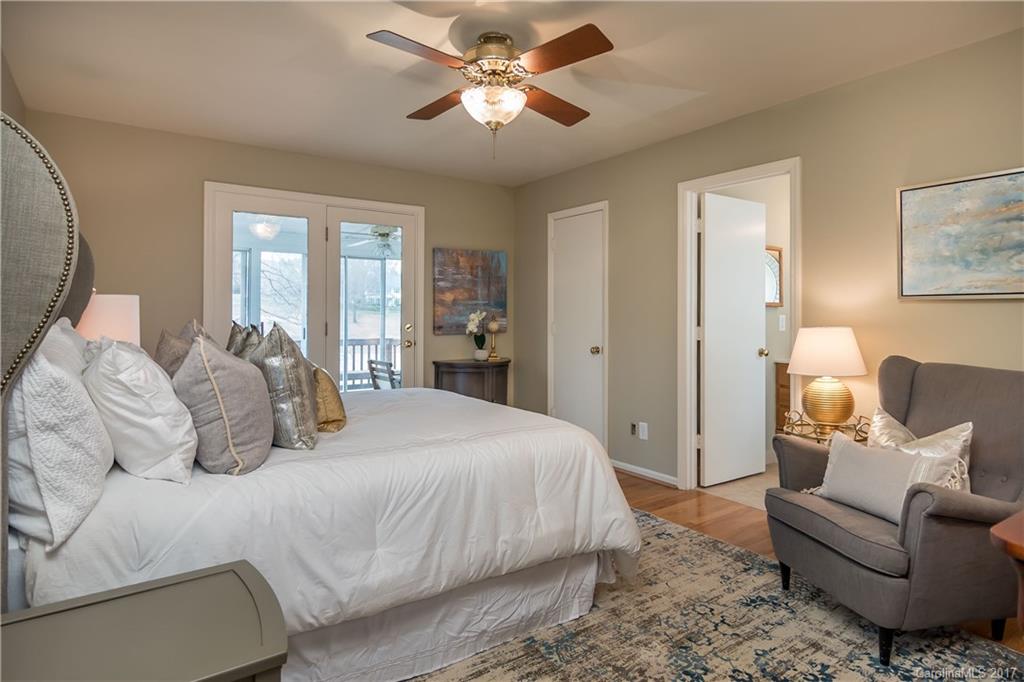 9300 Fairway Ridge Road Charlotte, NC 28277 - Photo 12 of 23 a bedroom with a bed couch and window