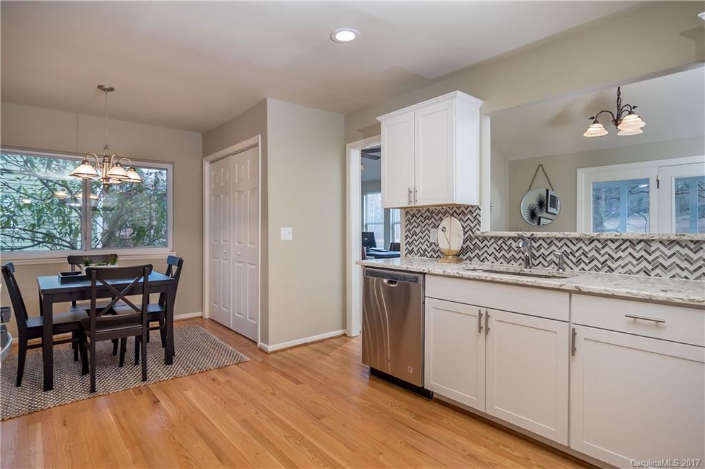 9300 Fairway Ridge Road Charlotte, NC 28277 - Photo 6 of 23 a view of dining table chairs and wooden floor
