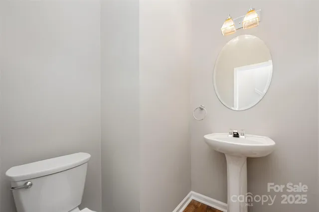 a view of backyard with roof deck