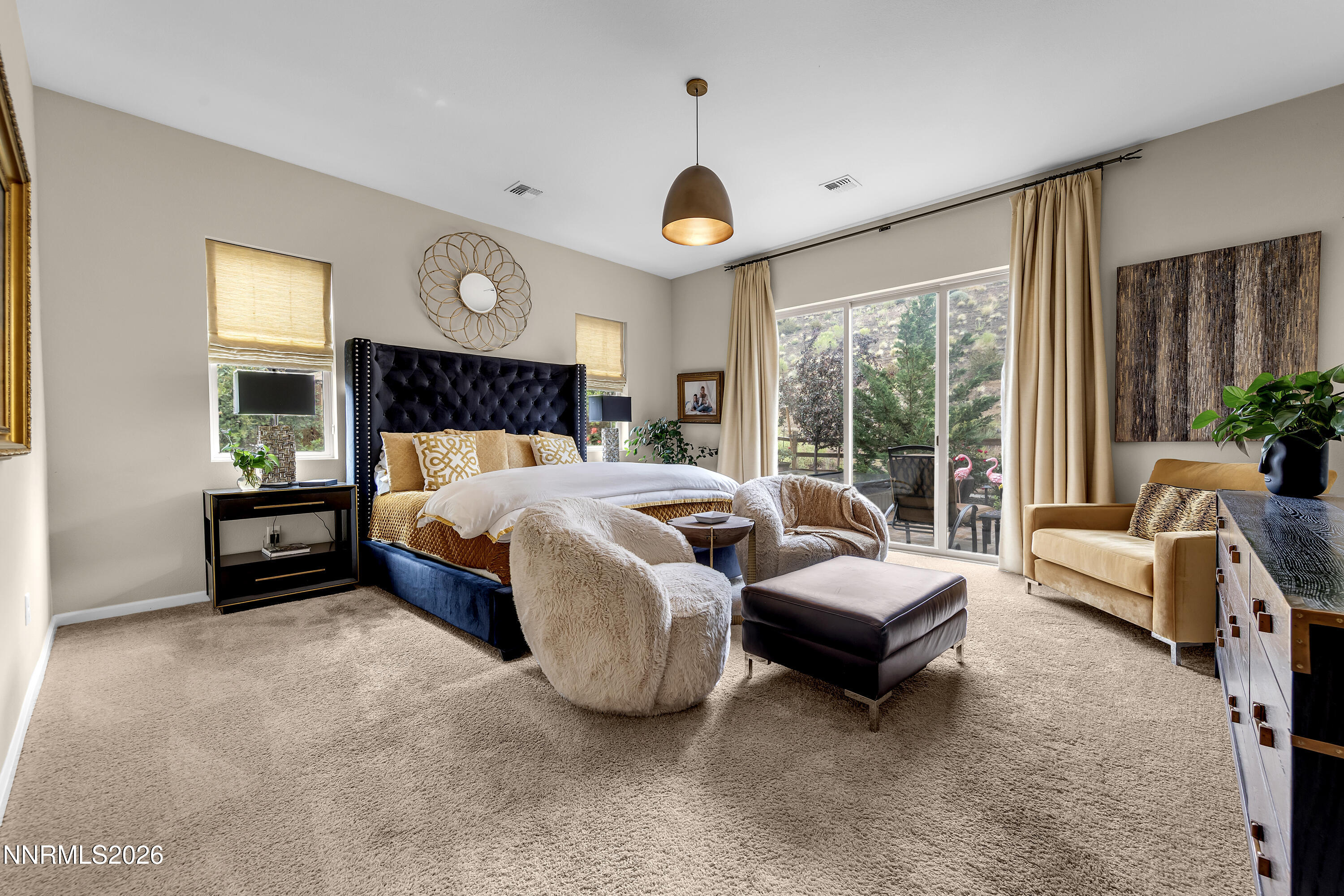 9021 Iron Sky Court Reno, NV 89523 - Photo 23 of 39 a living room with furniture and a large window