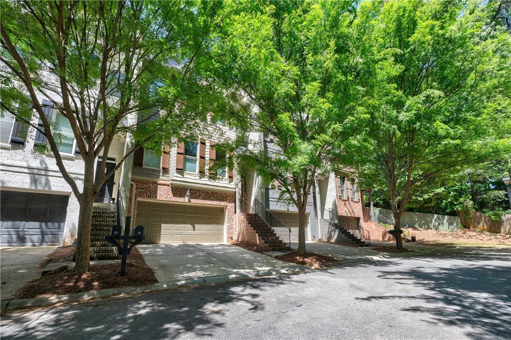 19 Oakhurst Common Drive Decatur, GA 30030 - Photo 1 of 1 a front view of a house with a yard