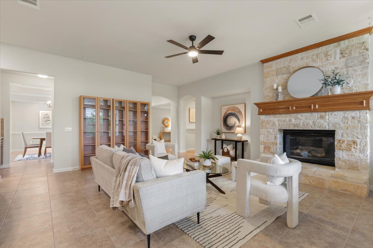 1709 Grassy Field Road Austin, TX 78737 - Photo 6 of 31 lovely living room complete with stone fireplace