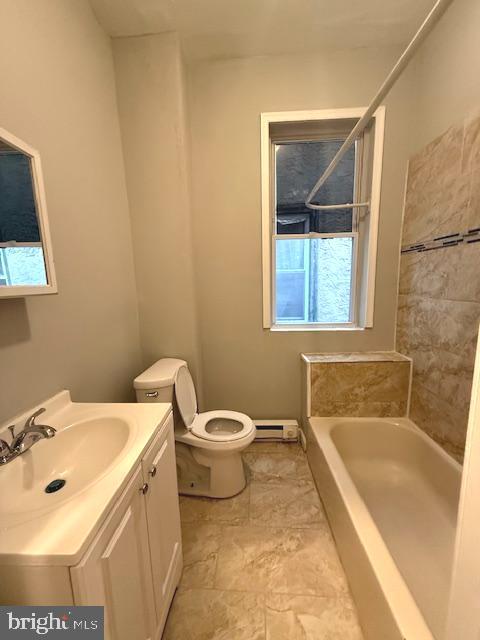 6245 Market Street Philadelphia, PA 19139 - Photo 5 of 8 a bathroom with a sink and a bathtub
