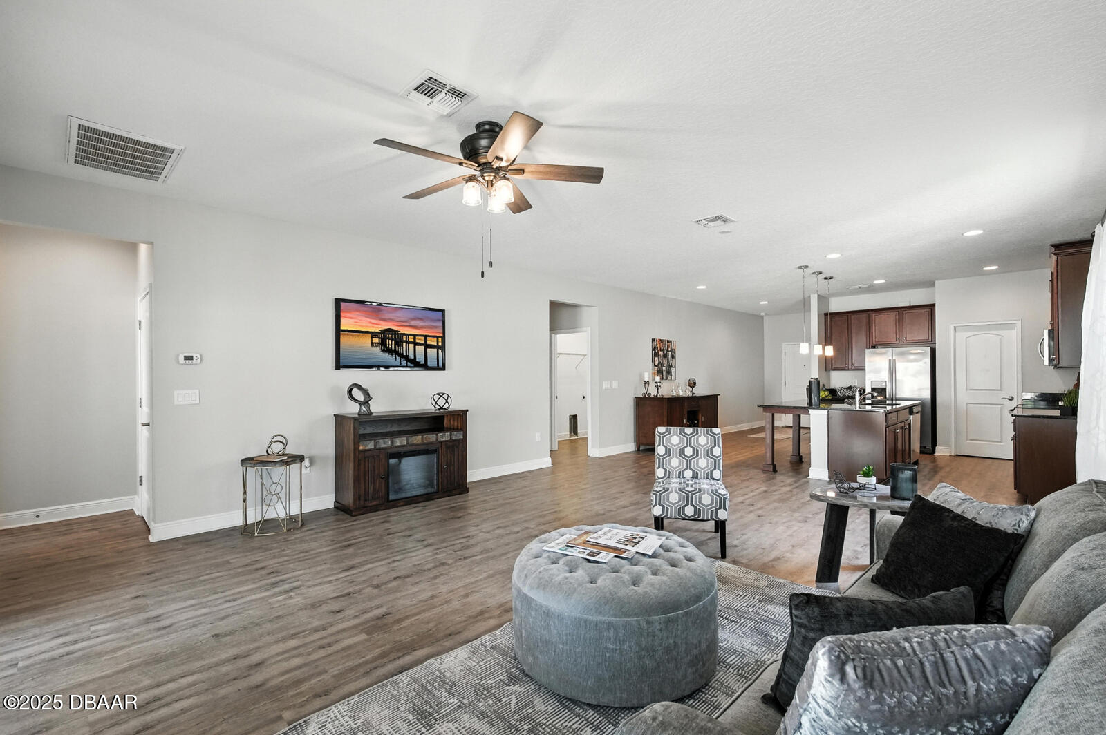5428 Estero Loop Port Orange, FL 32128 - Photo 16 of 41 a living room with furniture and a flat screen tv