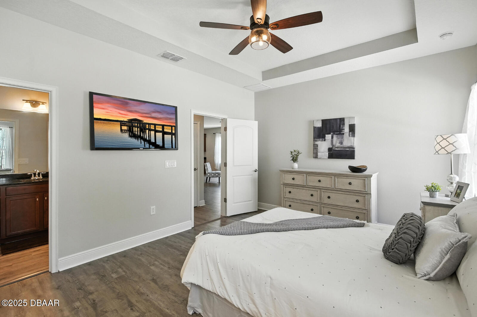 5428 Estero Loop Port Orange, FL 32128 - Photo 22 of 41 a bedroom with a bed and a flat screen tv