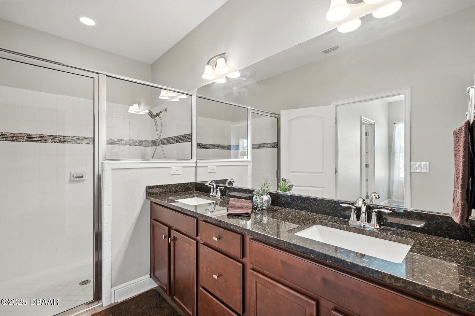 5428 Estero Loop Port Orange, FL 32128 - Photo 26 of 41 a bathroom with a granite countertop sink mirror and double