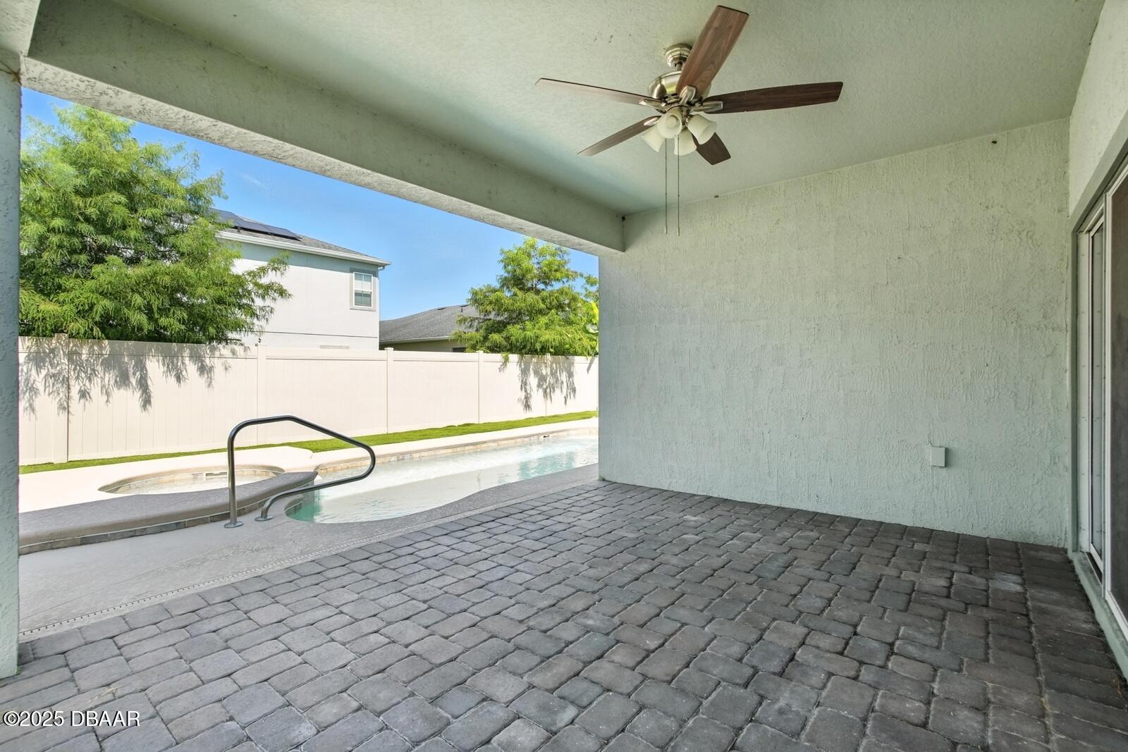 5428 Estero Loop Port Orange, FL 32128 - Photo 27 of 41 a view of a room with a window and a ceiling fan