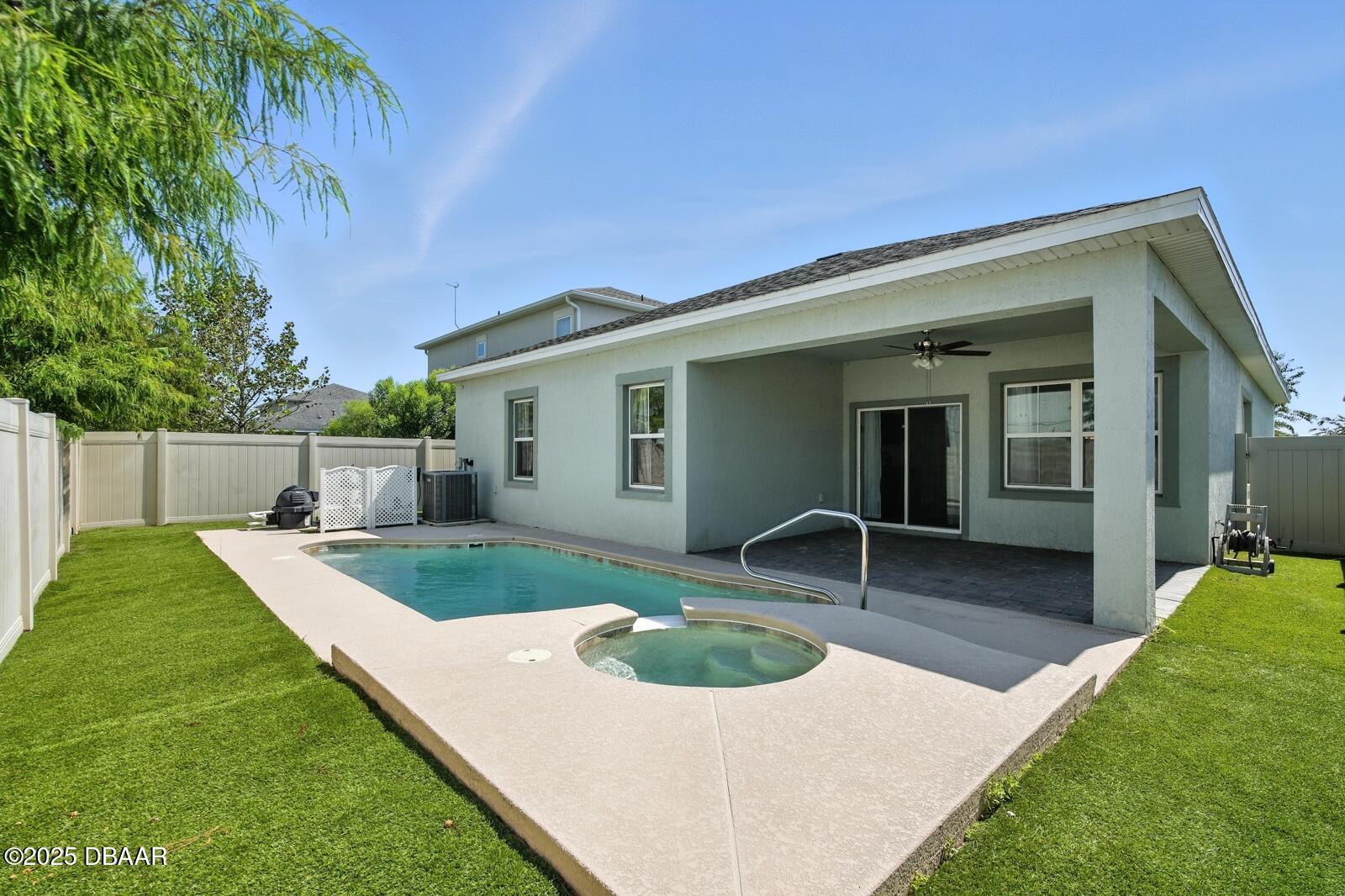 5428 Estero Loop Port Orange, FL 32128 - Photo 31 of 41 a view of a house with backyard and sitting area