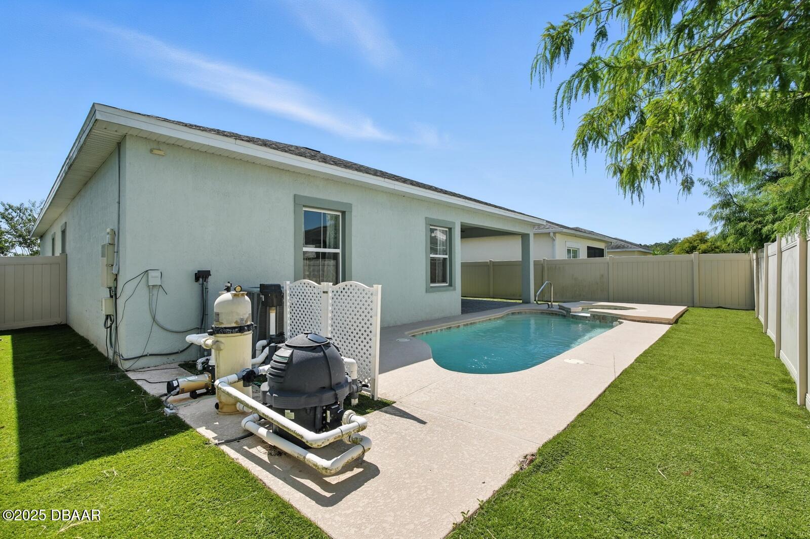 5428 Estero Loop Port Orange, FL 32128 - Photo 32 of 41 a front view of a house with garden