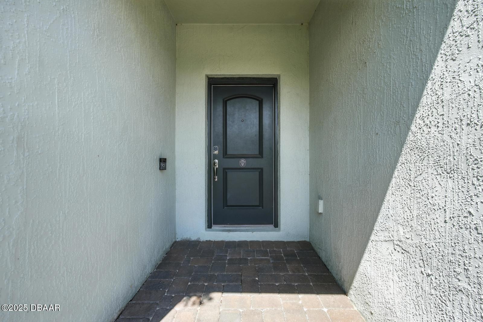 5428 Estero Loop Port Orange, FL 32128 - Photo 6 of 41 a view of a door in the hallway