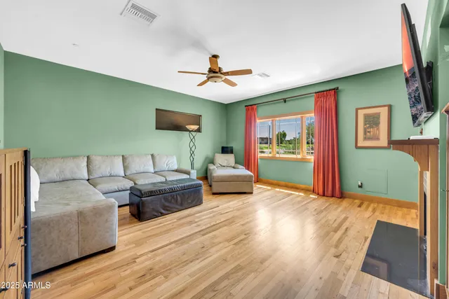 a view of a livingroom with furniture and a table