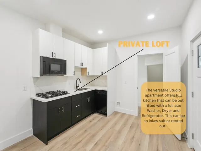 a kitchen with stainless steel appliances kitchen island granite countertop a stove and a sink