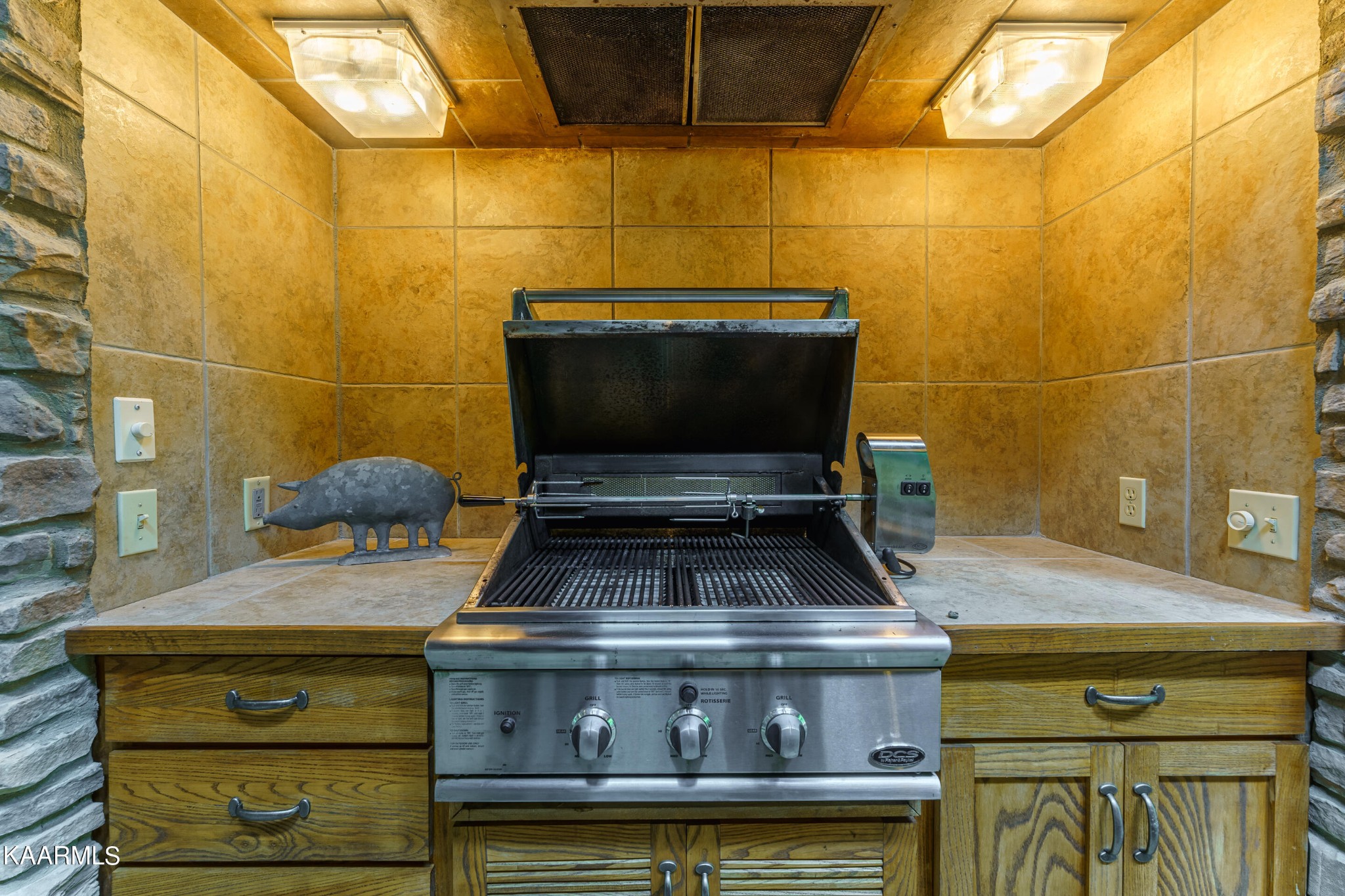 4614 Whetstone Road Sevierville, TN 37862 - Photo 35 of 60 a stove top oven sitting inside of a kitchen