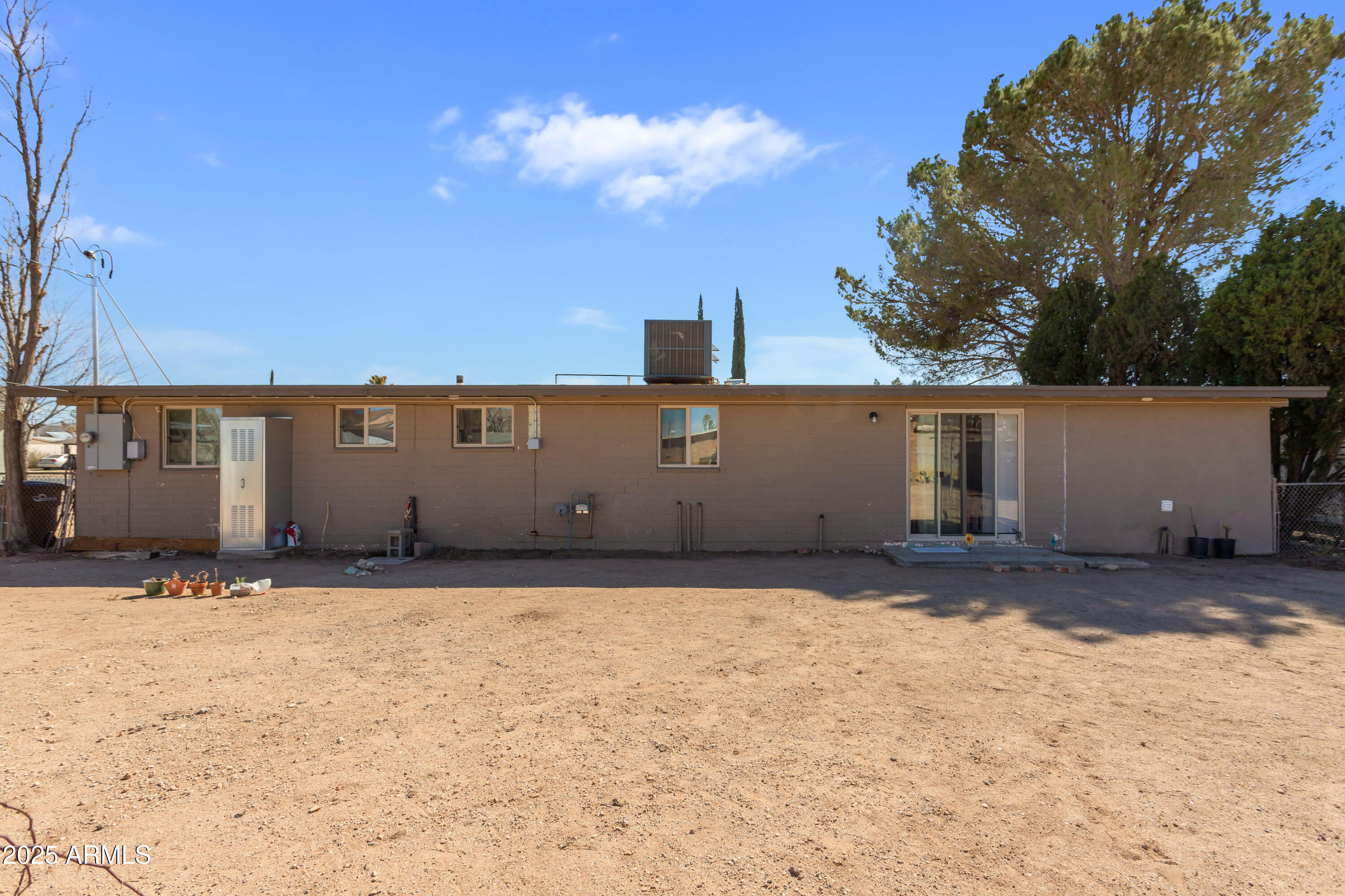 2128 East 8th Street Douglas, AZ 85607 - Photo 29 of 32 front view of a house with a yard