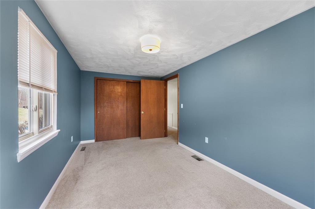 4930 Ashbaugh Road Murrysville, PA 15668 - Photo 20 of 44 2nd Bedroom with nice size closet and new light fixture