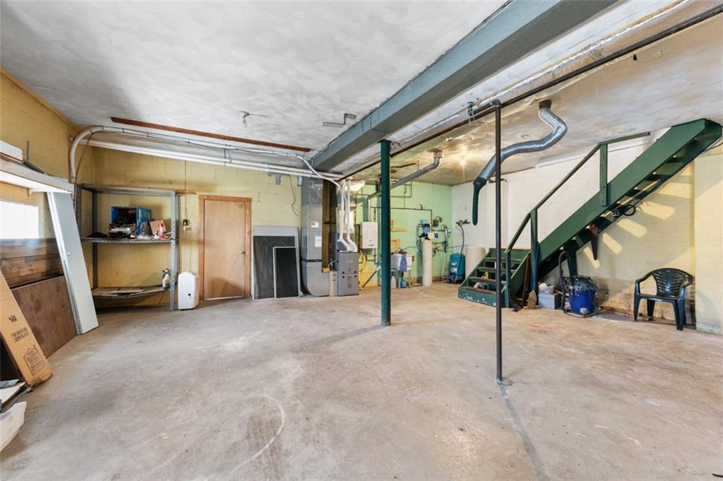 4930 Ashbaugh Road Murrysville, PA 15668 - Photo 27 of 44 Man door and door to rear Additional rooms