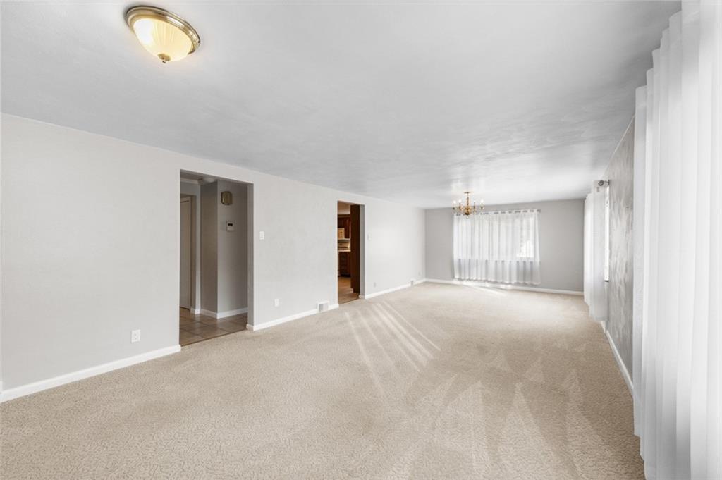 4930 Ashbaugh Road Murrysville, PA 15668 - Photo 6 of 44 Spacious Living Room / Dining room Combo 31x 13