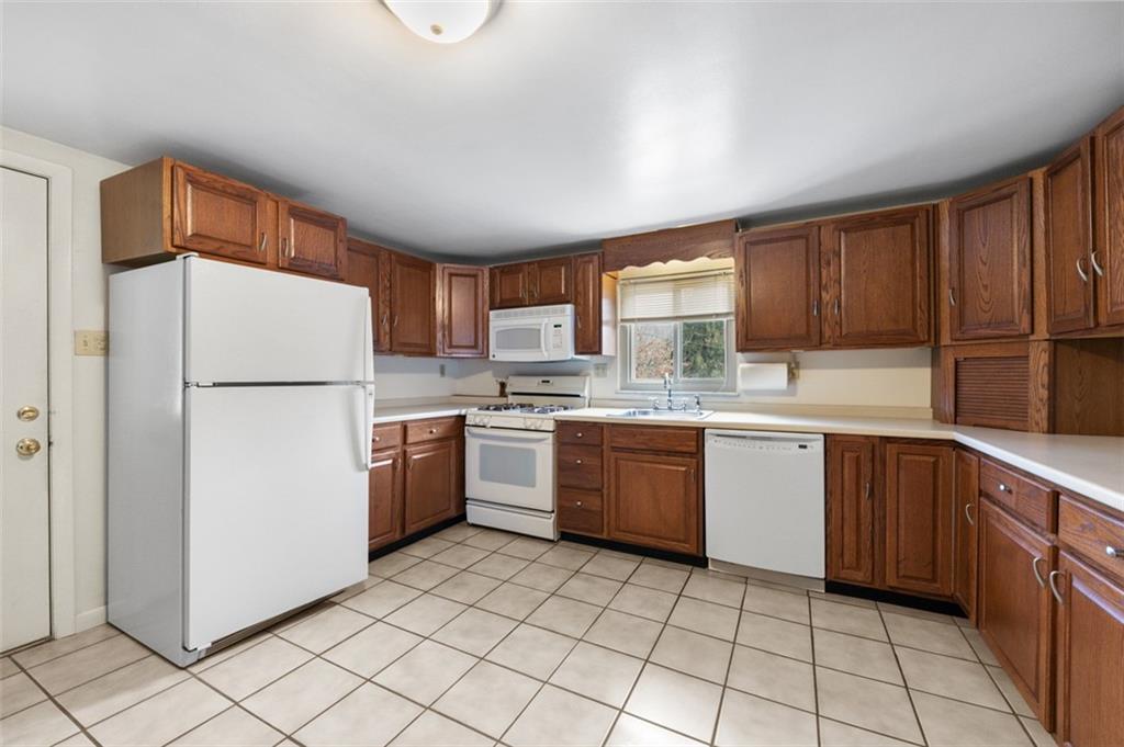 4930 Ashbaugh Road Murrysville, PA 15668 - Photo 8 of 44 Plenty of cabinets in this Eat in Kitchen