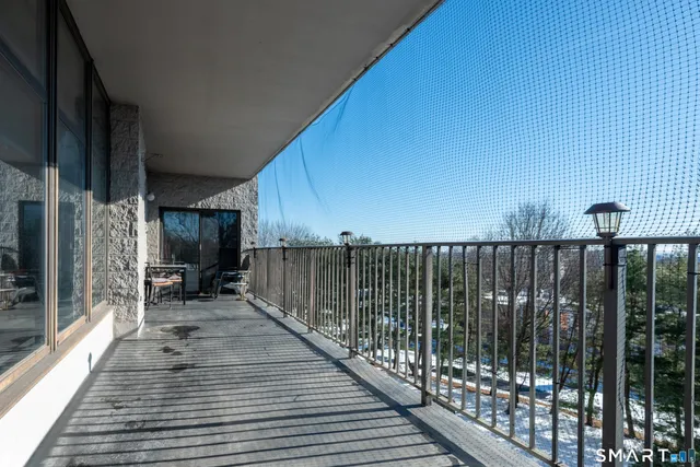 a bath tub sitting in a bathroom and mirror